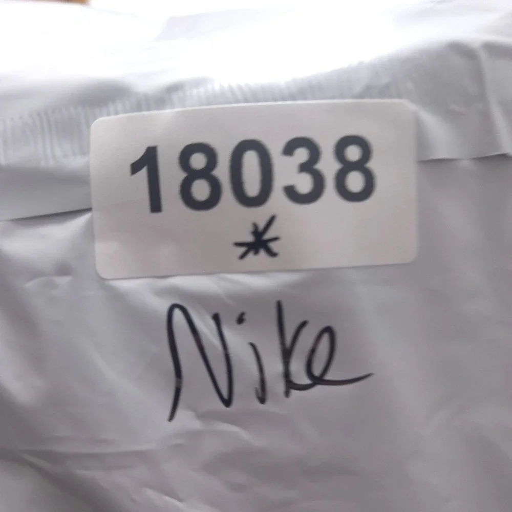 Nike used excellent
